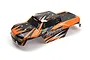 A pre-painted orange and black RC truck body shell for the BlackZon Spryte MT, featuring geometric graphics and pre-cut mounting holes.