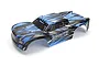 A pre-painted blue and black stadium truck body shell for the BlackZon Spryte RC car, featuring aggressive geometric graphics and branding.
