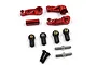 A set of red anodized aluminium steering arms, tie-rod ends, and hardware for an RC car on a white background.