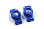 A pair of dark blue anodized aluminium rear hubs for RC cars by Yeah Racing, shown from a top-down perspective on a white background.