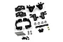 A set of black anodized aluminium RC car suspension and steering parts by Yeah Racing, including hubs, knuckles, bearings, screws, and pins.