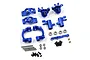 A set of dark blue anodized aluminium RC car suspension parts including steering knuckles, C-hubs, bearings, screws, and pins.