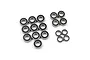 A set of 18 metal ball bearings with black rubber seals arranged on a white background.