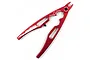 A red anodized aluminium multi-function shock plier tool by Yeah Racing, viewed from above against a white background.