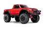 A studio shot of a red Traxxas TRX-4 Sport RC rock crawler truck on a white background.