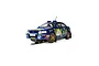 A 1/32 scale Scalextric slot car model of a blue 1995 Subaru Impreza WRX rally car with Repsol livery and number 5, positioned on a slot car track.