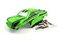 A green and black painted RC truck body shell for the BlackZon Slyder MT Turbo, shown with an included decal sheet on a white background.