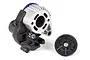 Traxxas 1/16 scale brushed transmission assembly with a separate black spur gear on a white background.