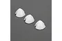 Three small white foam propeller spinners arranged in a diagonal line on a grey background.