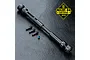 MST steel telescopic CVD driveshaft with included pins and a grub screw on a textured black surface.