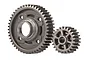A Traxxas 47T/24T overdrive gear set consisting of one large gear and one smaller gear made of grey metal.