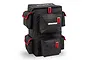 A black Traxxas RC car backpack with multiple storage compartments, red trim, and white Traxxas branding on a white background.