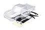 A clear, unpainted Traxxas TRX-4 Sport clipless RC body shell shown with its included decal sheet on a white background.