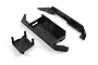 A set of black plastic RC chassis parts including a main battery tray and support components on a white background.