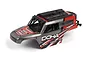 A pre-painted red and grey Maverick Doha RC truck body shell with black roof accessories, shown from a high-angle studio view.