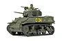 A 1/48 scale model of a U.S. M5A1 Stuart light tank painted in olive drab with a tank commander figure in the hatch.