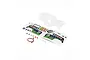 Losi 1/18 Grave Digger clear unpainted RC truck body shell with included decal sheet, LED light wire, and small hardware components.
