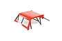 A red RC boat roof and black roll cage assembly isolated on a white background.