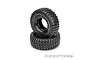 Two black JConcepts 1.9 crawler tires stacked on top of each other against a white background.