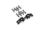 Kyosho black plastic rear hub carriers and associated bushings on a sprue tree.