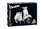 Italeri 1/9 scale Vespa 125 Primavera plastic model kit box featuring a white scooter on a black background.