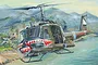 Box art illustration of a US Army UH-1 Huey helicopter flying over a river near a village, featuring shark mouth nose art.