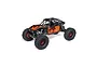 Axial UTB10 Capra 1.9 4WS RC rock crawler in orange and black with Fox branding, shown from a three-quarter angle on a white background.
