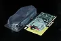 Tamiya 1/10 scale clear polycarbonate Toyota GR Supra RC car body shell with included decal sheet, window masks, and side mirror parts.