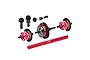 A set of GPM Racing RC differential parts including red aluminum housings, black steel gears, and a red aluminum driveshaft on a white background.