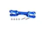 A blue anodized aluminium steering link for Traxxas X-Maxx with four metal bushings and two flat-head screws on a white background.