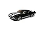 A 1/10 scale Losi 1969 Chevy Camaro V100 RC car in black with white racing stripes, shown from a high-angle front three-quarter view on a white background.