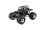 A studio shot of the Losi LMT 1/10 scale solid axle RC monster truck roller, showing the black tube chassis, large off-road tires, and suspension components.