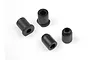 Four black plastic RC car components, including two flanged bushings and two ball mount caps, arranged on a white background.