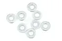 Eight small silver metal washers arranged on a white background.
