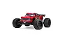 A studio shot of the ARRMA Outcast 8S BLX RC Truggy in red, featuring large off-road tires and a detailed truck body on a white background.