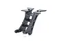 A black plastic Kyosho wing mount spare part for an RC car, shown from a side angle against a white background.