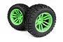Two Maverick MixBlok monster truck wheels with black rubber tyres and bright green plastic rims, shown at an angle on a white background.