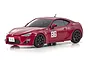 A studio shot of a red Kyosho Mini-Z Toyota 86 RC car with the number 86 on the door, set against a plain white background.