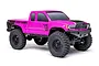 A studio shot of the pink Axial SCX24 Base Camp 1/24 scale RC rock crawler truck on a white background.