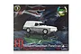 Front view of the DDA Collectables 1/24 scale 1975 Holden HJ Sandman Panelvan plastic model kit box, featuring a silver model car on a dark background.