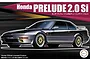 Box art for a Fujimi 1/24 scale Honda Prelude 2.0Si Tuning Version plastic model kit featuring a dark grey modified Honda Prelude.