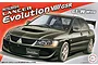 Box art for a Fujimi 1/24 scale Mitsubishi Lancer Evolution VIII GSR plastic model kit featuring a dark grey car with a GT-W wing.