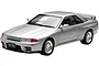 A silver 1/24 scale Fujimi Nissan Skyline R32 GT-R plastic model car on a white background.