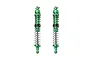 Two green anodized aluminium RC shock absorbers with silver coil springs, standing vertically against a white background.