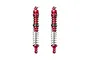 Two GPM Racing red anodized aluminium adjustable RC shock absorbers with silver springs against a white background.