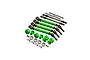 GPM Racing upgrade kit featuring green aluminum driveshafts, wheel hexes, steel steering links, bearings, and hardware on a white background.