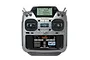 Futaba T26SZ 26-channel RC transmitter with a silver finish, dual screens, and multiple control switches, shown from a front-facing studio perspective.