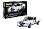 Revell 1/24 scale 1966 Shelby GT 350 R Stirling Moss model car kit box and a fully assembled model car on a white background.