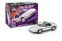 A Revell 1/24 scale 1985 Pontiac Fiero GT plastic model kit box next to a fully assembled white model car.