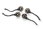 Four BetaFPV 1102 brushless drone motors with black housings, copper windings, and attached wires with white connectors on a white background.